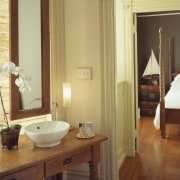 A view of this bathroom featuring polished timber bathroom, floor, flooring, hardwood, home, interior design, laminate flooring, real estate, room, sink, suite, wall, window, wood, wood flooring, brown