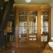 a view of this closet  constructed out cabinetry, ceiling, door, floor, flooring, furniture, hardwood, home, interior design, room, window, wood, wood flooring, wood stain, brown