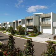 Ab exterior view of the Magenta shores holiday/residential apartment, architecture, building, condominium, corporate headquarters, elevation, estate, home, house, metropolitan area, mixed use, neighbourhood, property, real estate, residential area, villa, teal