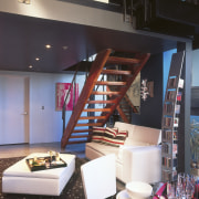 A view of the living area, concrete flooring, interior design, loft, black