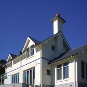 MJ Reid Plasters, Christchurch, applied Rockcote's LiteRock Solid building, facade, home, house, property, real estate, roof, sky, window, blue