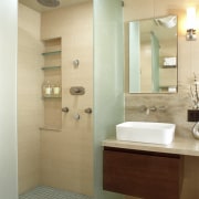 A view of some bathroom ware from NKBA. bathroom, bathroom accessory, bathroom cabinet, floor, home, interior design, plumbing fixture, room, sink, orange