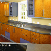 A view of this kitchen featuring the Corian cabinetry, countertop, floor, flooring, interior design, kitchen, room, brown