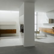 A view of this kitchen featuring Sleek contemporary architecture, countertop, floor, flooring, interior design, product design, tile, gray