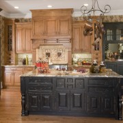 A view of this kitchen designed by Kitchen cabinetry, countertop, cuisine classique, hardwood, interior design, kitchen, room, black, brown