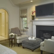 A view of the master bedroom featuring carpet ceiling, estate, fireplace, floor, flooring, furniture, hearth, home, interior design, living room, real estate, room, wall, gray