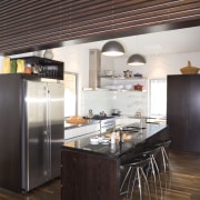 View of kitchen and living area designed by ceiling, countertop, interior design, kitchen, loft, black