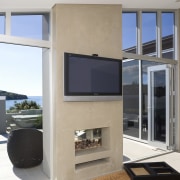 A close up view of the fireplace in fireplace, floor, hearth, interior design, living room, gray