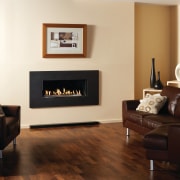 Designed with modern lifestyles in mind, the new fireplace, floor, flooring, furniture, hardwood, hearth, home, home appliance, interior design, living room, room, wood burning stove, wood flooring, brown, white