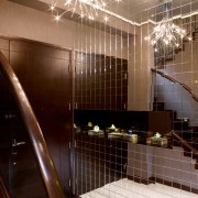 View of the feature wall in the living architecture, ceiling, glass, interior design, lighting, lobby, wood, red