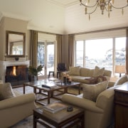 The great room acts as a central space ceiling, estate, home, interior design, living room, property, real estate, room, suite, window, window treatment, brown, gray