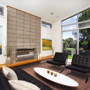 A view of this retro living area that architecture, house, interior design, living room, real estate, window, white