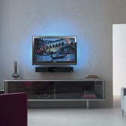 A view a home theatre system from Phillips display device, flat panel display, furniture, home, interior design, living room, room, shelving, table, television, gray