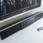 A view a home theatre system from Phillips display device, electronics, flat panel display, furniture, product, product design, technology, white, black