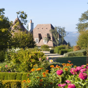 View of house from the garden. - View autumn, botanical garden, cottage, estate, flora, flower, garden, grass, home, house, landscape, landscaping, leaf, mansion, national trust for places of historic interest or natural beauty, nature, plant, real estate, shrub, sky, spring, tree, brown