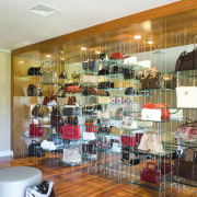 The handbag shelving unit is 25ft wide and display window, interior design, retail, brown