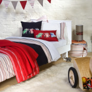 A view of these childrens Bedrooms featuring colourful bed, bed frame, bed sheet, bedding, bedroom, duvet cover, floor, flooring, furniture, interior design, linens, room, textile, white