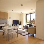 From wood floors to high-end kitchen appliances, 8 floor, flooring, hardwood, home, interior design, laminate flooring, living room, property, real estate, room, window, wood, wood flooring, orange