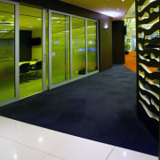 A view of the timber/tile and carpet flooring architecture, floor, flooring, glass, house, interior design, wall, window