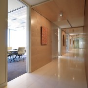 This passage features Sycamore crown-cut wwod panels that apartment, architecture, ceiling, daylighting, door, floor, flooring, glass, house, interior design, property, real estate, window, brown