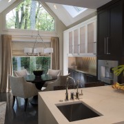 View of a renovated kitchen and dining area architecture, countertop, home, house, interior design, kitchen, real estate, room, window, gray, black