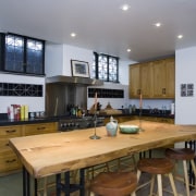 View of the kitchen featuring nutral walls, mosaic countertop, interior design, kitchen, real estate, gray