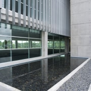 This sustainable office building in Auckland, the head architecture, building, condominium, facade, glass, window, gray