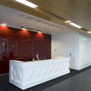 This sustainable office building in Auckland, the head architecture, ceiling, daylighting, floor, flooring, interior design, lobby, product design, brown