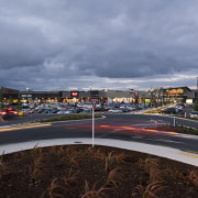 The main pool and beach resturant at Radisson asphalt, car, city, cloud, evening, metropolitan area, residential area, road, sky, suburb, urban area, teal, black