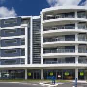 The main pool and beach resturant at Radisson apartment, architecture, building, commercial building, condominium, corporate headquarters, elevation, facade, headquarters, metropolitan area, mixed use, property, real estate, residential area, tower block