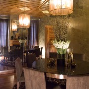 A view of the dining area, wooden flooring, ceiling, dining room, home, interior design, living room, lobby, restaurant, room, table, brown