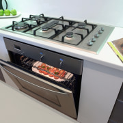 A view of some kitchen appliance from Fisher gas stove, home appliance, kitchen appliance, kitchen stove, major appliance, gray