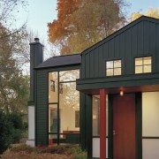 The exterior colour scheme of dark green and architecture, building, cottage, facade, farmhouse, home, house, real estate, siding, window, brown, black