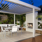 An exterior view of the patio area, decking, backyard, interior design, outdoor structure, patio, pergola, property, real estate, roof, shade, gray, brown