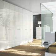 A view of a storage space designed by architecture, door, floor, furniture, glass, interior design, wall, wardrobe, white