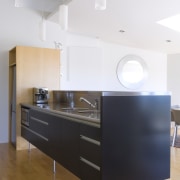 A view of the kitchen area, wooden flooring architecture, cabinetry, countertop, floor, furniture, hardwood, interior design, kitchen, product design, room, wood flooring, white