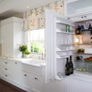 View of kitchen designed by architect Gary McFarlane cabinetry, countertop, cuisine classique, home, home appliance, interior design, kitchen, major appliance, refrigerator, room, window, gray