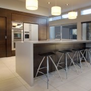 View of kitchen designed by Jackson + Jackson countertop, floor, flooring, interior design, kitchen, real estate, room, table, gray, brown