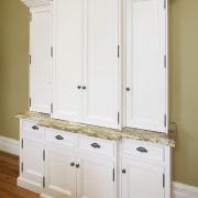 View of cabinetry by Scullery &amp; Holz - bathroom accessory, cabinetry, chest of drawers, cupboard, drawer, furniture, hardwood, molding, room, shelf, wood stain, white, brown