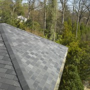 View of roof by RW Stokes Enterprises - architecture, asphalt, daylighting, outdoor structure, path, road surface, roof, walkway, wall, gray, brown