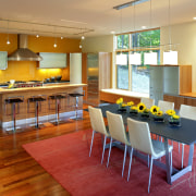 A view of a kitchen design by Valcucine dining room, interior design, kitchen, lobby, real estate, restaurant, room, table, orange, brown