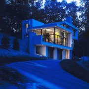 View of a house designed by Charles R architecture, blue, building, estate, evening, facade, home, house, landscape lighting, light, lighting, majorelle blue, night, property, real estate, residential area, sky, window, blue