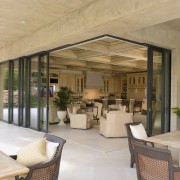 View of sliding doors by American View Windows. ceiling, estate, interior design, living room, real estate, brown, orange, gray