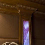 View of room with woodwork by Trim Tech. ceiling, column, interior design, light, light fixture, lighting, wall, wood, brown