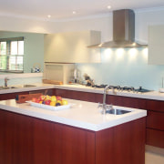 Everything is within reach in this design by cabinetry, countertop, cuisine classique, interior design, kitchen, property, real estate, room, gray, red