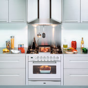 Ilve's Quadra and Nostalgie gas ovens offer expansive cabinetry, countertop, cuisine classique, gas stove, home appliance, interior design, kitchen, kitchen appliance, kitchen stove, major appliance, refrigerator, room, small appliance, white