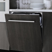 A view of some kitchen appliances by Maytag. angle, bed frame, chest of drawers, drawer, floor, furniture, home appliance, product, product design, sideboard, black, gray