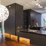 Contemporary kitchen and dining area featuring black glass ceiling, interior design, gray, black