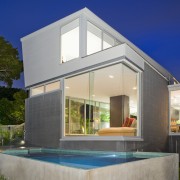 Exterior view of contemporary house featuring a swimming architecture, daylighting, estate, facade, family car, home, house, interior design, property, real estate, swimming pool, villa, window, gray