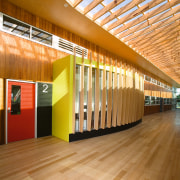 View of Williamstown High School in Melbourne. Designed architecture, ceiling, daylighting, floor, flooring, interior design, lobby, wood, orange, brown